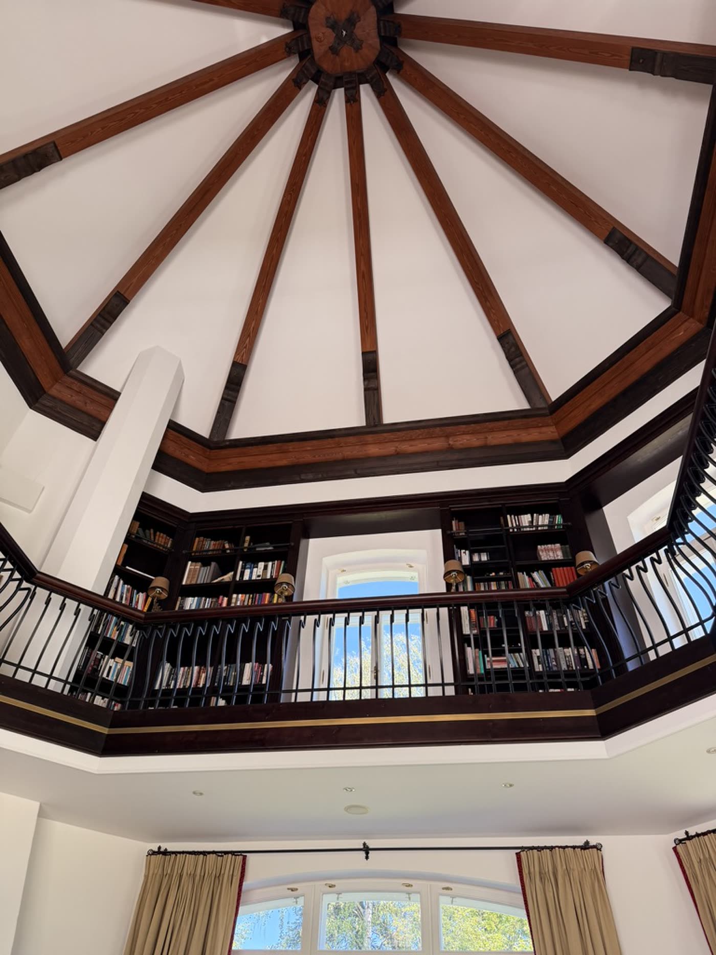The Karlheinz Muhr Library reading room: shelves of bound volumes beneath the dome.